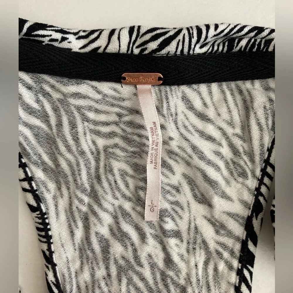 Free People | NWT Animal Print RacerBack Tank